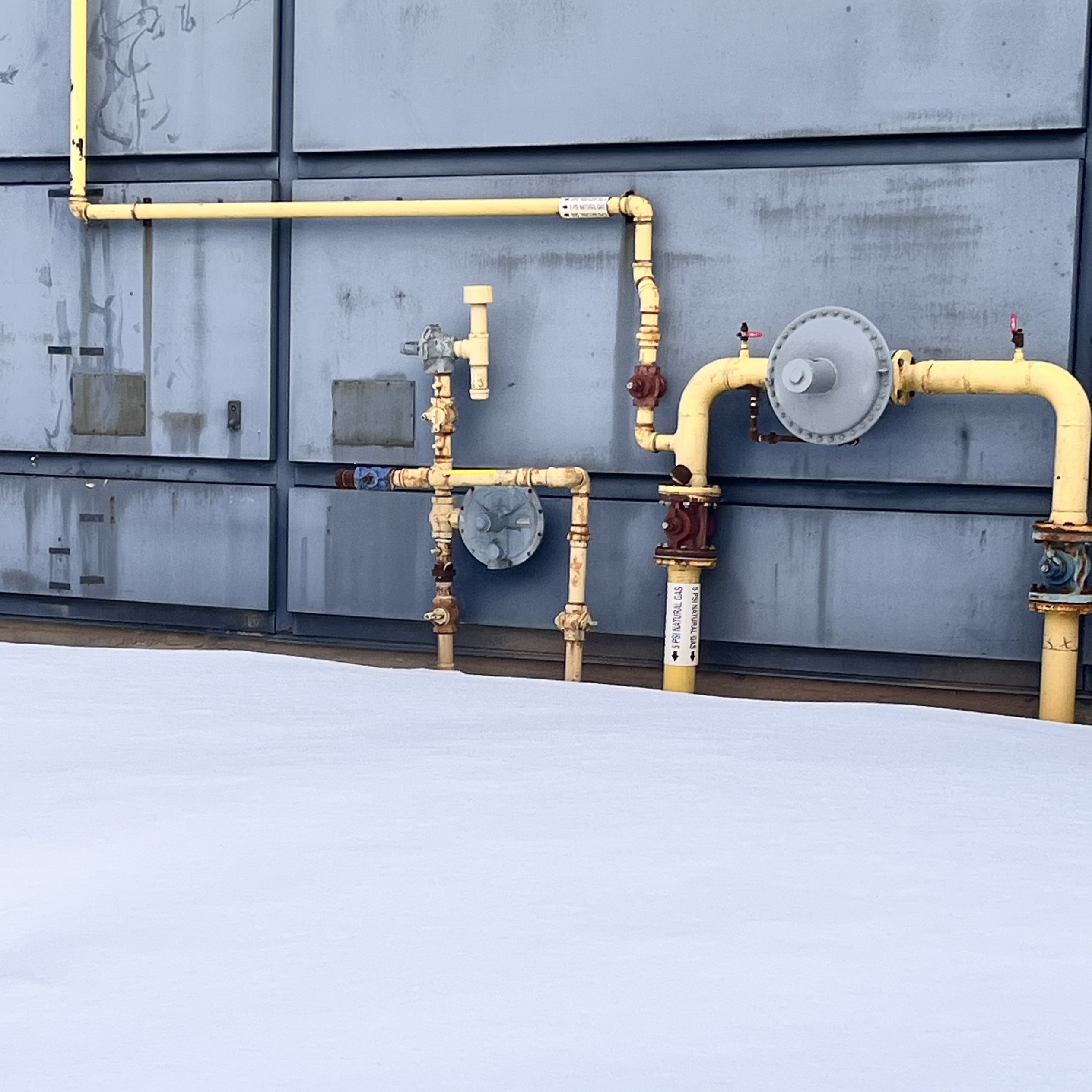 As I walked around the campus outdoors, I heard this mechanical noise coming from the pipes.