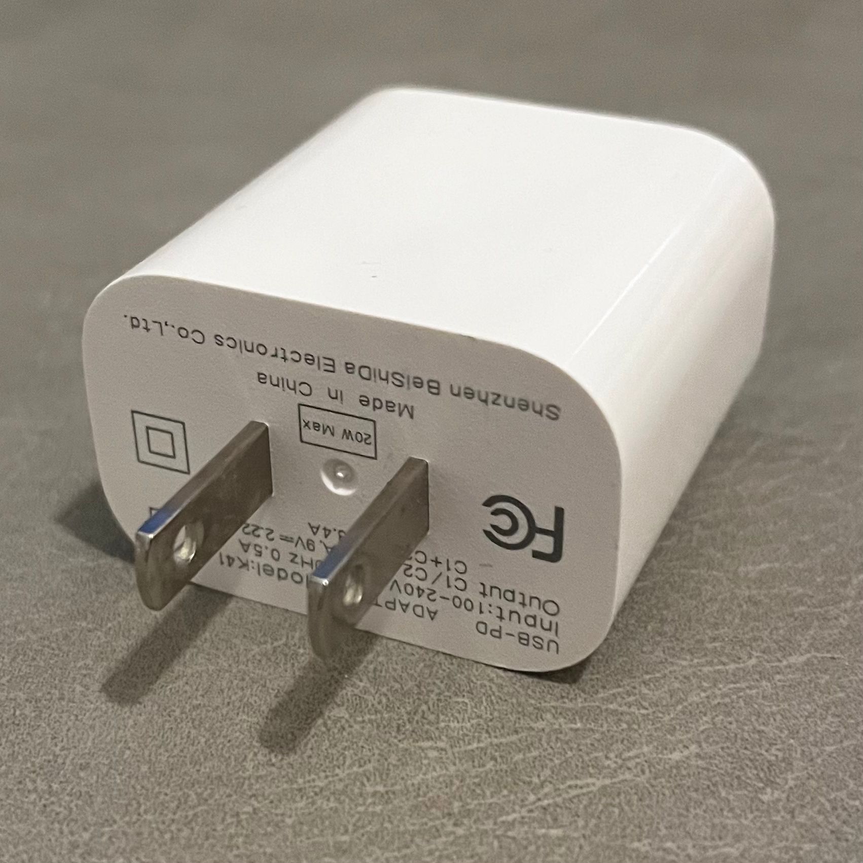 This photo of adapter was taken from a closer distance, the details are visible.